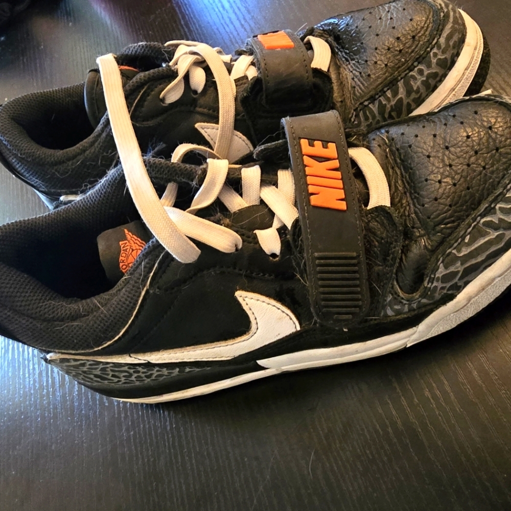 Nike Kids Black and White Sneakers with Orange Accents